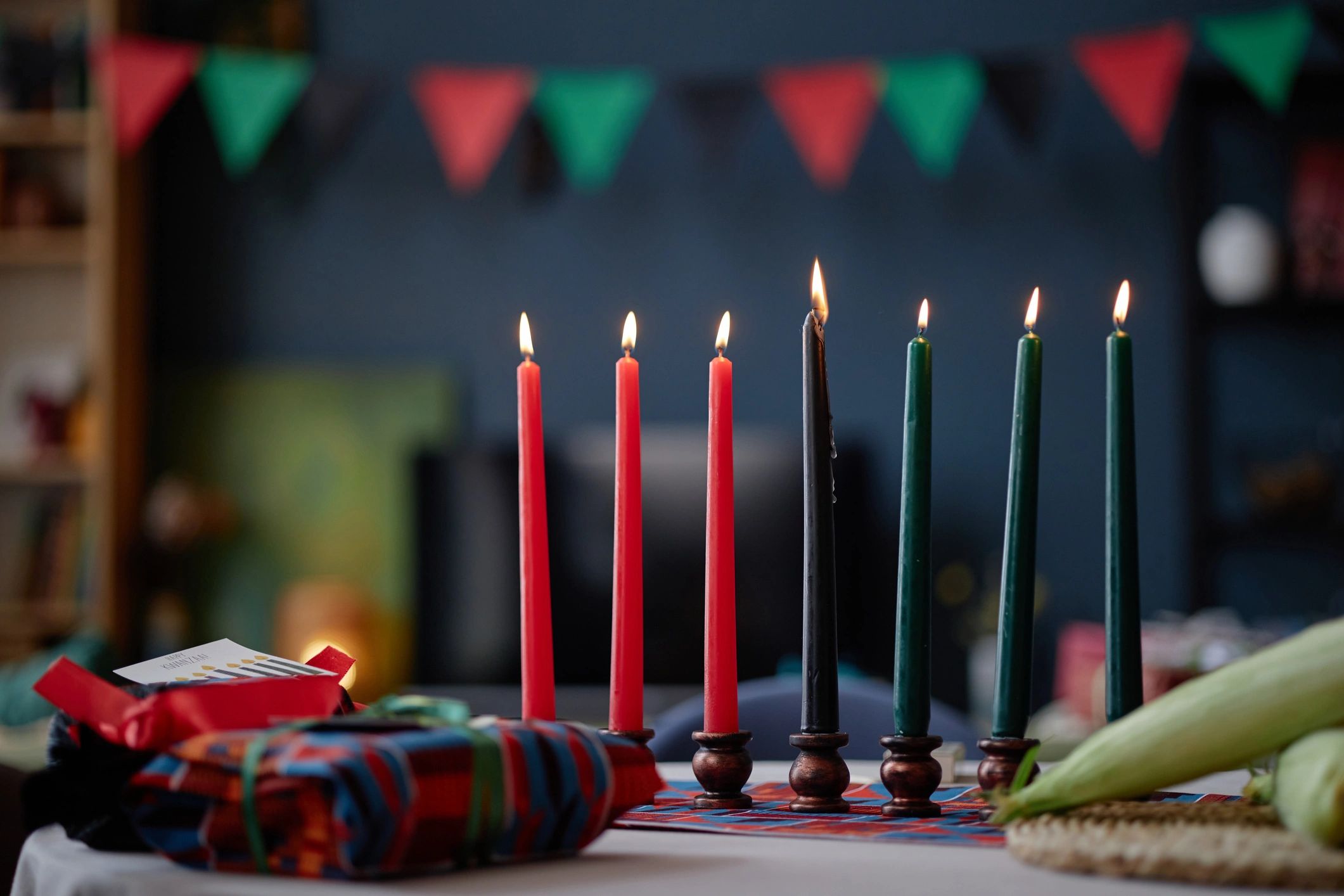 Decorative candle holder with lit candles
